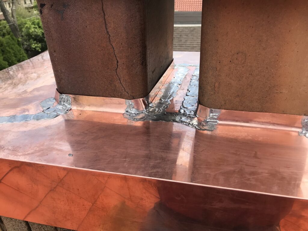Copper Chimney Cap on Milwaukee Roof